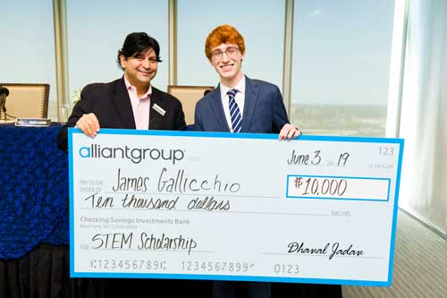 James and Dhaval with his check